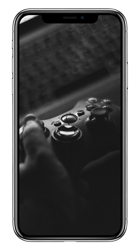 Phone with an image of a gaming remote and someone playing a game.